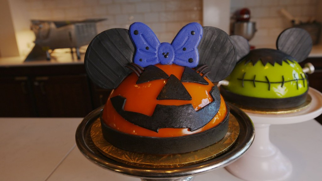 Picture of: This Gigantic Pumpkin Minnie Cake Is Covered In The Prettiest, Shiniest  Orange Mirror Glaze